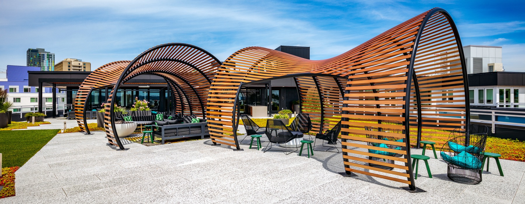 sculptured pergolas shade outdoor sitting areas